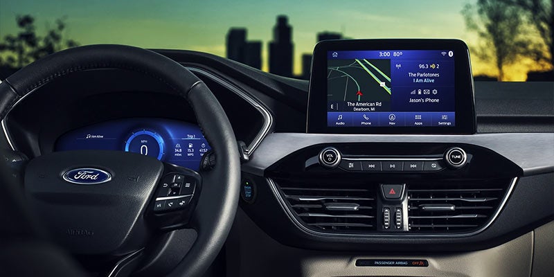 Car dashboard with steering wheel and center screen