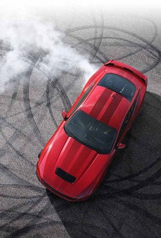 Overhead view of a 2025 Ford Mustang® model with tire tracks on pavement | Mike Reichenbach Ford in Florence SC