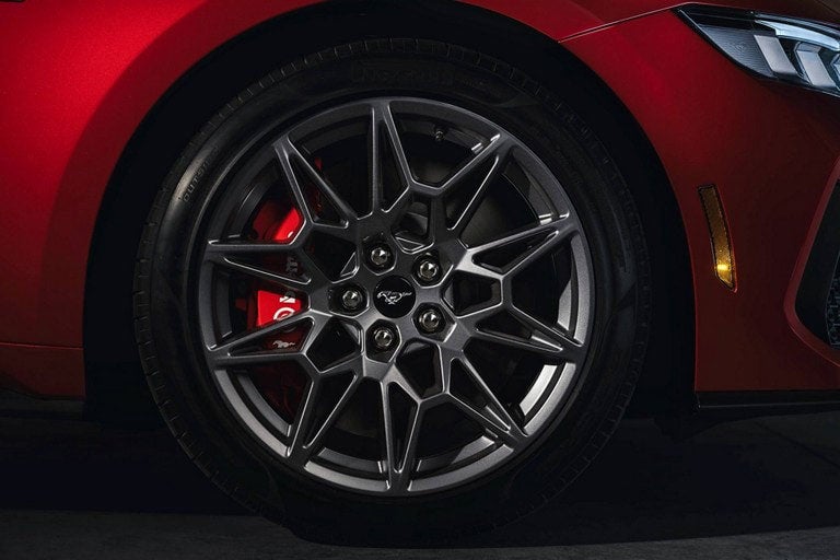2025 Ford Mustang® model with a close-up of a wheel and brake caliper | Mike Reichenbach Ford in Florence SC