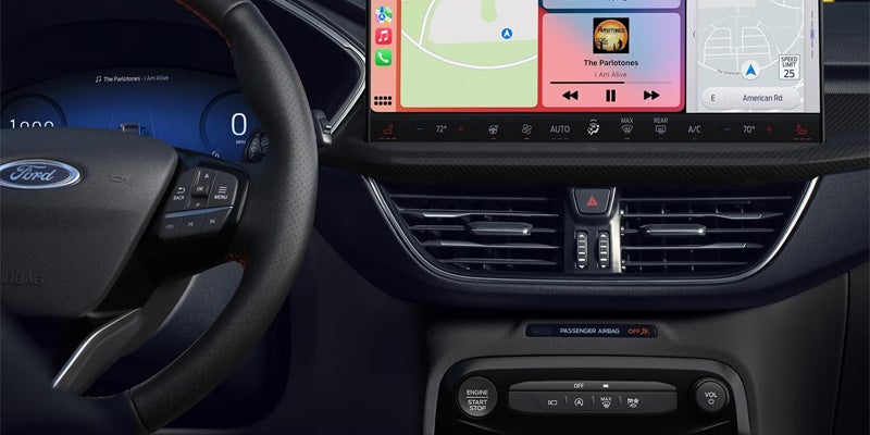 Dashboard with steering wheel and large touchscreen